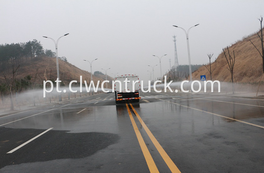 street water spray truck in action 2